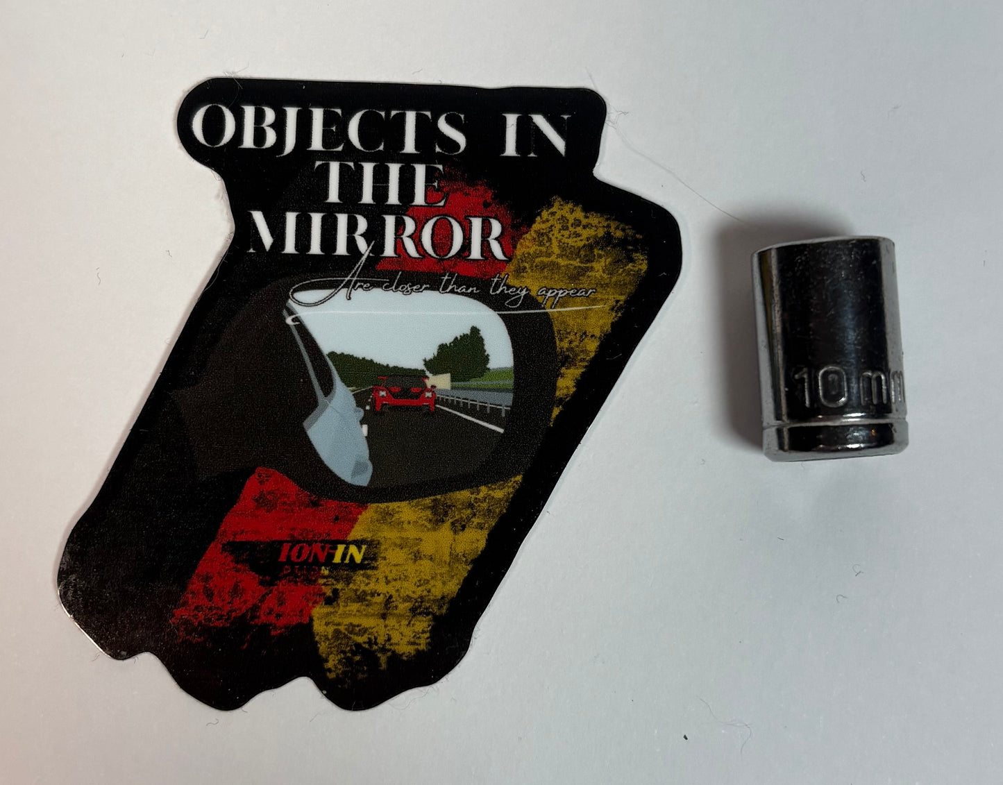 Objects In The Mirror Gloss Vinyl sticker (2.5in) - V1